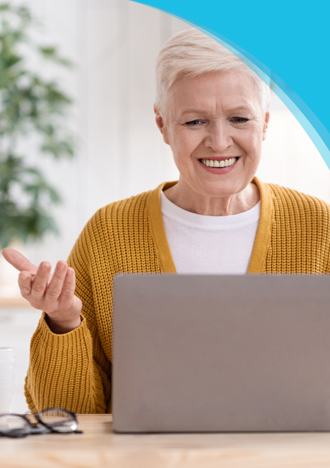Code of Conduct | Canadian Hard Of Hearing Association - Woman smiling having conversation to a person on a laptop