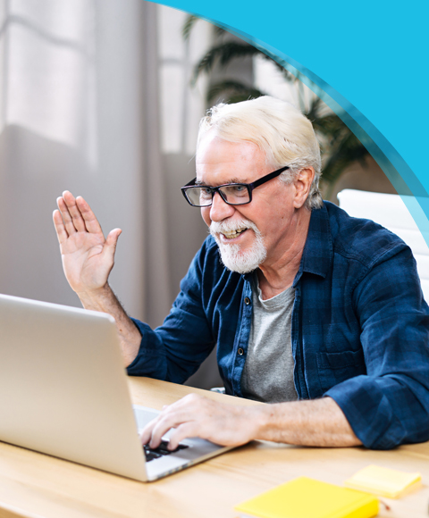 FAQs | Canadian Hard Of Hearing Association - Man waving hi to someone on laptop screen